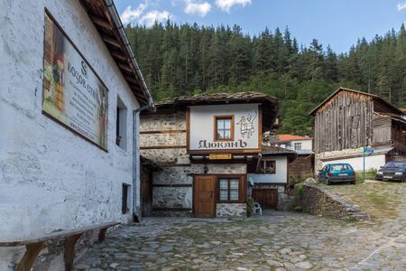 SHIROKA LAKA, BULGARIA - AUGUST 14, 2018: Nineteenth century houses in historical town of Shiroka Laka, Smolyan Region, Bulgariaのeditorial素材
