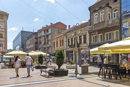 NIS, SERBIA - JUNE 15, 2019: Walking people on Obrenoviceva pedestrian street at the center of City...
