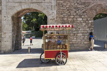 ISTANBUL, TURKEY - JULY 26, 2019: Roasted Corn and Chestnuts stand at the Entrance of Gulhane Park...