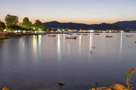 STAVROS, GREECE - AUGUST 20, 2019:  Sunset view of Coastal street of village of Stavros, Chalkidiki, Central Macedonia, Greeceのeditorial素材