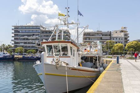 KAVALA, GREECE - JUNE 22, 2019: Fishing Boats at port of city of Kavala, East Macedonia and Thrace,...