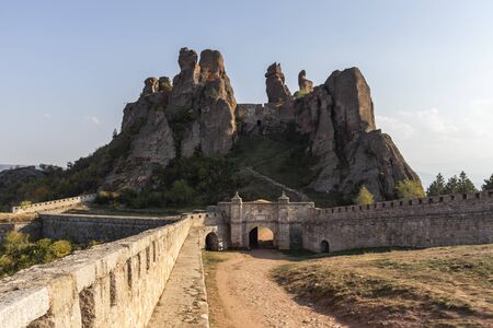 BELOGRADCHIK, BULGARIA - OCTOBER 19, 2019: Sunset view of Ruins of Medieval Belogradchik Fortress...