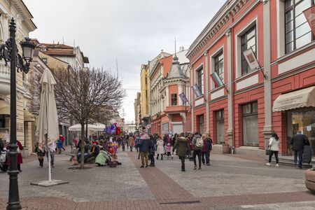 PLOVDIV, BULGARIA - DECEMBER 23, 2019: Walking people at central pedestrian street in City of Plovdiv, Bulgariaのeditorial素材