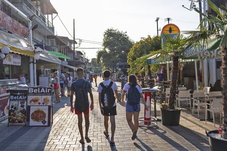 STAVROS, GREECE - AUGUST 19, 2019: Main pedestrian street of town of Stavros, Chalkidiki, Central Macedonia, Greeceのeditorial素材