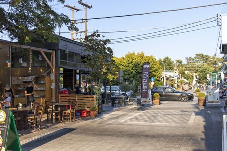 STAVROS, GREECE - AUGUST 19, 2019: Main pedestrian street of town of Stavros, Chalkidiki, Central Macedonia, Greeceのeditorial素材