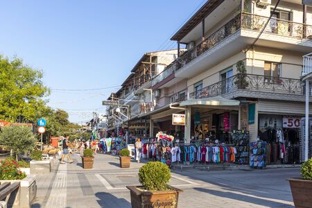 STAVROS, GREECE - AUGUST 19, 2019: Main pedestrian street of town of Stavros, Chalkidiki, Central Macedonia, Greeceのeditorial素材