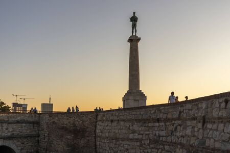 BELGRADE, SERBIA - AUGUST 12, 2019: Sunset view of The Victor monument at Belgrade Fortress, Kalemegdan Park in city of Belgrade, Serbiaのeditorial素材