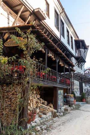 MELNIK, BULGARIA - DECEMBER 31, 2019: Typical street and old houses at town of Melnik, Blagoevgrad...