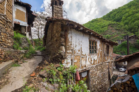 PIRIN, BULGARIA -  MAY 2, 2014: Old houses from the nineteenth century in village of Pirin,...