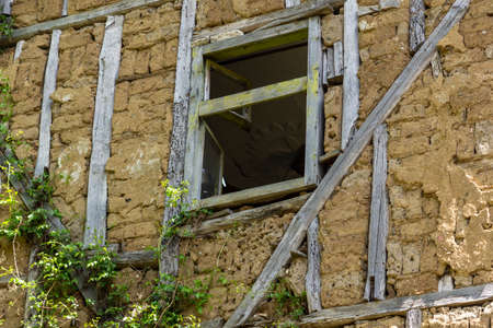 PIRIN, BULGARIA -  MAY 2, 2014: Old houses from the nineteenth century in village of Pirin, Blagoevgrad Region, Bulgariaのeditorial素材