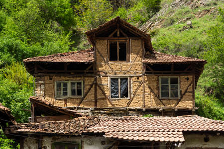 PIRIN, BULGARIA -  MAY 2, 2014: Old house know as The House of Pirin Dragon in village of Pirin, Blagoevgrad Region, Bulgariaのeditorial素材