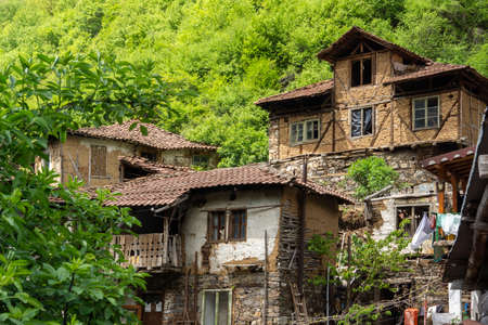 PIRIN, BULGARIA -  MAY 2, 2014: Old house know as The House of Pirin Dragon in village of Pirin, Blagoevgrad Region, Bulgariaのeditorial素材