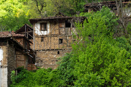 PIRIN, BULGARIA -  MAY 2, 2014: Old houses from the nineteenth century in village of Pirin,...