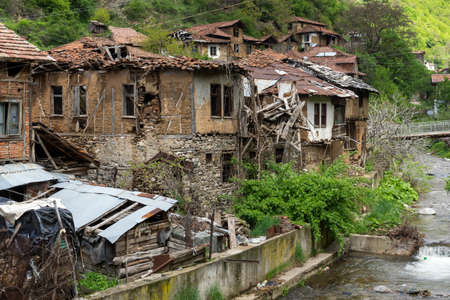 PIRIN, BULGARIA -  MAY 2, 2014: Old houses from the nineteenth century in village of Pirin,...