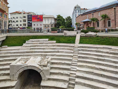 PLOVDIV, BULGARIA - MAY 19, 2020: Dzhumaya Mosque and Ruins of Roman stadium in city of Plovdiv,...
