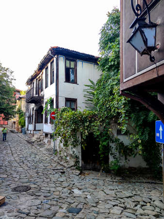 PLOVDIV, BULGARIA - SEPTEMBER 4, 2020: Street and Nineteenth Century Houses in architectural and...
