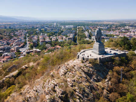 PLOVDIV, BULGARIA - SEPTEMBER 6, 2020: Aerial view of Monument of the Soviet Army known as Alyosha and panorama of city of Plovdiv, Bulgariaのeditorial素材