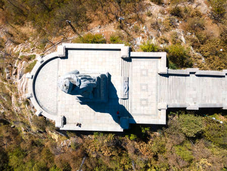 PLOVDIV, BULGARIA - SEPTEMBER 6, 2020: Aerial view of Monument of the Soviet Army known as Alyosha and panorama of city of Plovdiv, Bulgariaのeditorial素材
