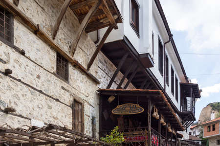 MELNIK, BULGARIA - APRIL 9, 2021: Typical street and old houses in historical town of Melnik, Blagoevgrad region, Bulgariaのeditorial素材