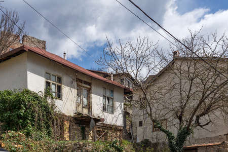 MELNIK, BULGARIA - APRIL 9, 2021: Typical street and old houses in historical town of Melnik, Blagoevgrad region, Bulgariaのeditorial素材