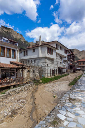 MELNIK, BULGARIA - APRIL 9, 2021: Typical street and old houses in historical town of Melnik, Blagoevgrad region, Bulgariaのeditorial素材