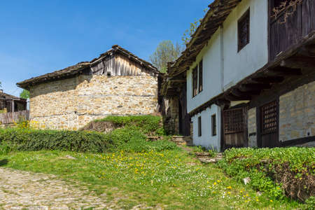 Typical street and old houses at historical village of Bozhentsi, Gabrovo region, Bulgariaのeditorial素材