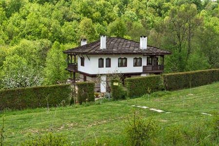 BOZHENTSI, BULGARIA - MAY 3, 2021: Typical street and old houses at historical village of Bozhentsi, Gabrovo region, Bulgariaのeditorial素材