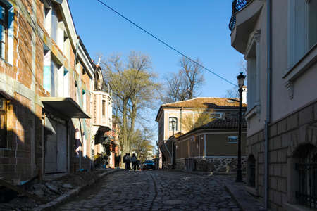 PLOVDIV, BULGARIA - JANUARY 2, 2022:  Street and Nineteenth Century Houses in architectural and...