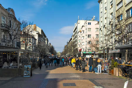 SOFIA, BULGARIA -FEBRUARY 26, 2022: Walking people on Boulevard Vitosha in city of Sofia, Bulgariaのeditorial素材
