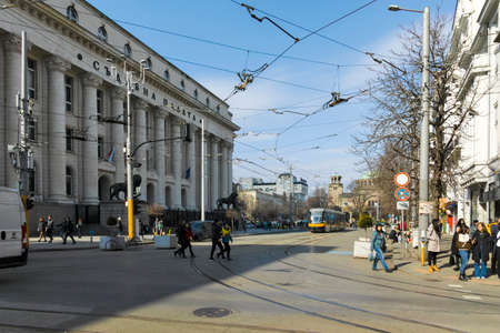SOFIA, BULGARIA -FEBRUARY 26, 2022: Walking people on Boulevard Vitosha in city of Sofia, Bulgaria