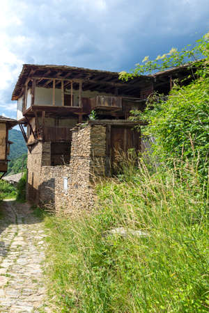 KOVACHEVITSA, BULGARIA - JUNE 30, 2020: Village of Kovachevitsa with Authentic nineteenth century...