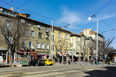 SOFIA, BULGARIA -FEBRUARY 25, 2022: Typical street and building at the center of city of Sofia,...