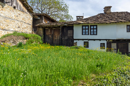 Typical street and old houses at historical village of Bozhentsi, Gabrovo region, Bulgariaのeditorial素材