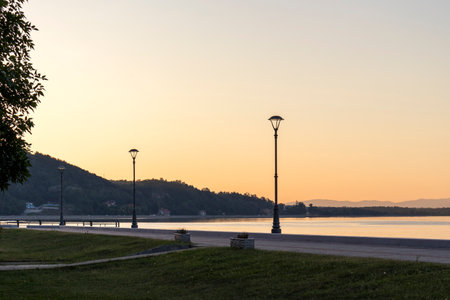 GOLUBAC, SERBIA - AUGUST 11, 2019: Amazing Sunset landscape of Danube River passing through a town...