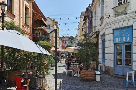 PLOVDIV, BULGARIA - AUGUST 1, 2022: Typical street and building at the center of city of Plovdiv,...