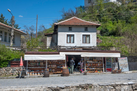 MELNIK, BULGARIA - APRIL 13, 2023: Typical street and old houses at town of Melnik, Blagoevgrad region, Bulgariaのeditorial素材