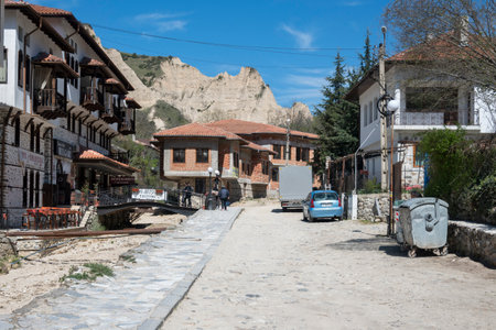 MELNIK, BULGARIA - APRIL 13, 2023: Typical street and old houses at town of Melnik, Blagoevgrad region, Bulgariaのeditorial素材
