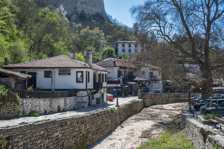 MELNIK, BULGARIA - APRIL 13, 2023: Typical street and old houses at town of Melnik, Blagoevgrad region, Bulgariaのeditorial素材