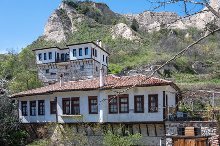 MELNIK, BULGARIA - APRIL 13, 2023: Typical street and old houses at town of Melnik, Blagoevgrad region, Bulgariaのeditorial素材