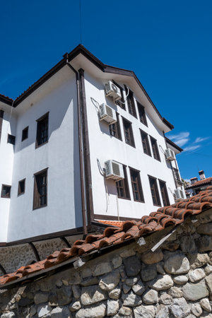 MELNIK, BULGARIA - APRIL 13, 2023: Typical street and old houses at town of Melnik, Blagoevgrad region, Bulgariaのeditorial素材
