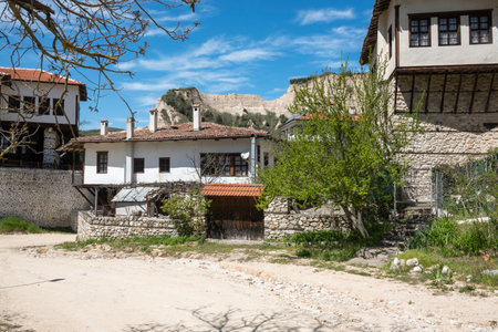 MELNIK, BULGARIA - APRIL 13, 2023: Typical street and old houses at town of Melnik, Blagoevgrad region, Bulgariaのeditorial素材