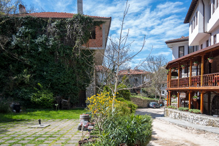 MELNIK, BULGARIA - APRIL 13, 2023: Typical street and old houses at town of Melnik, Blagoevgrad region, Bulgariaのeditorial素材