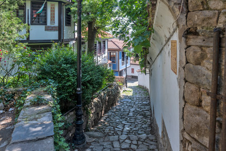 PLOVDIV, BULGARIA - MAY 23, 2023: Typical street and houses at The old town of city of Plovdiv, Bulgariaの写真素材