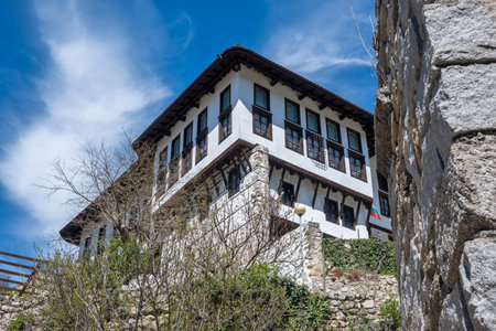 MELNIK, BULGARIA - APRIL 13, 2023: Typical street and old houses at town of Melnik, Blagoevgrad region, Bulgariaのeditorial素材