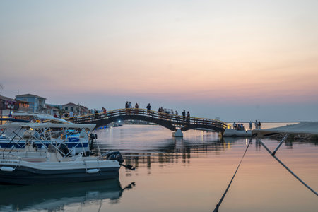 LEFKADA TOWN, GREECE - AUGUST 21, 2023: Amazing Sunset view of costal street of town of Lefkada, Ionian Islands, Greeceのeditorial素材
