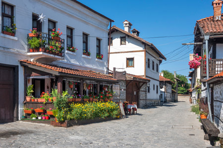 Typical street and buildings at old town of Bansko, Blagoevgrad Region, Bulgariaの写真素材