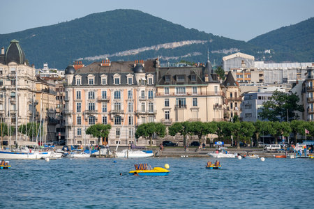 GENEVA, SWITZERLAND - JUNE 17, 2023: Amazing Panorama from costal steet at city of Geneva, Switzerlandのeditorial素材