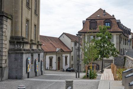 LAUSANNE, SWITZERLAND - JUNE 18, 2023: Typical Building and street at city of Lausanne, Canton of...