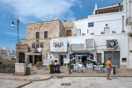 POLIGNANO A MARE, ITALY - MAY 13, 2024: Amazing view of The Old town of Polignano a Mare, Apulia Region, Italyのeditorial素材