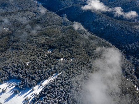 Amazing Aerial winter view of Rila mountain near Belmeken Dam, Bulgariaの写真素材
